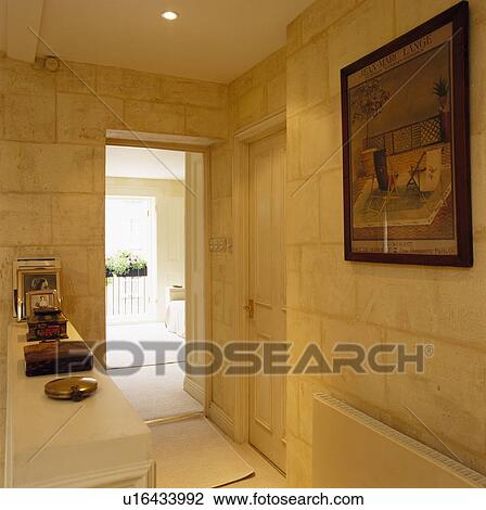 Large picture on paint-effect stone wall of modern landing View Large Photo Image Stock Image - Large picture on paint-effect stone wall of modern landing. Fotosearch