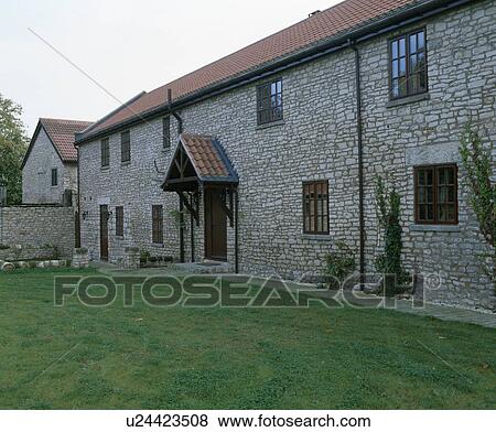 Stock Photo - Large stone barn conversion. Fotosearch