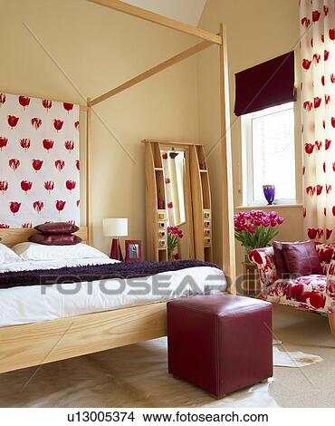 Picture - Leather cube stool below bed in modern bedroom. Fotosearch