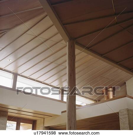 Looking up at ceiling in modern hall View Large Photo Image Stock Photo - Looking up at ceiling in modern hall. Fotosearch