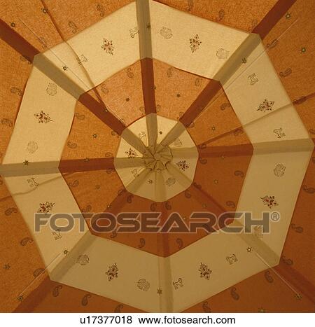 Looking up at orange and red roof of traditional Rajastani tent View Large Photo Image Stock Photo - Looking up at orange and red roof of traditional Rajastani tent. Fotosearch