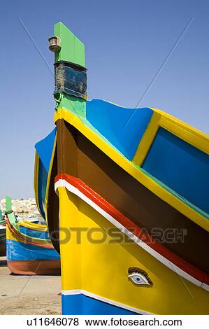 Luzzu fishing boat, Marsaxlokk Harbour, Marsaxlokk, Malta View Large Photo Image Stock Photo - Luzzu fishing boat, Marsaxlokk Harbour, Marsaxlokk, Malta. Fotosearch