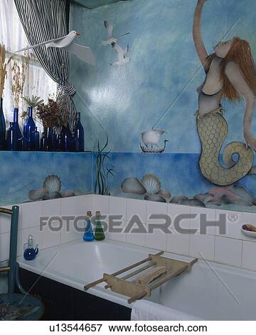 Mermaid mural above bath in eighties bathroom View Large Photo Image Stock Photo - Mermaid mural above bath in eighties bathroom. Fotosearch