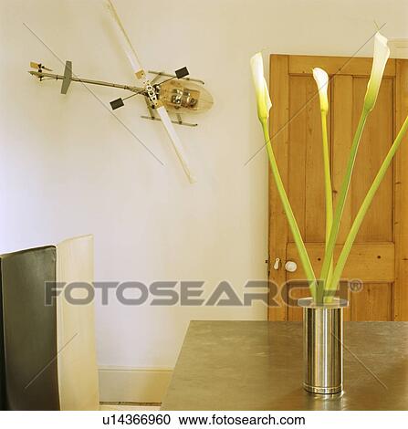 Model helicopter on wall of modern dining room View Large Photo Image Stock Image - Model helicopter on wall of modern dining room. Fotosearch