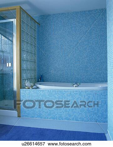 Stock Photo - Modern blue tiled bathroom. Fotosearch