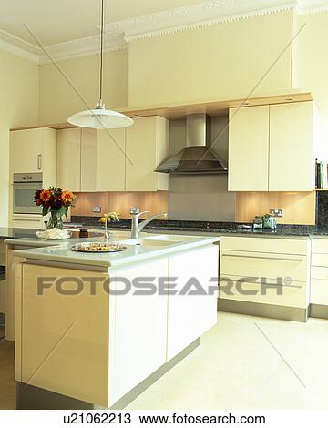 Modern cream kitchen View Large Photo Image Stock Image - Modern cream kitchen. Fotosearch