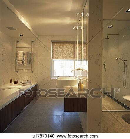 Stock Image - Modern marble tiled bathroom. Fotosearch