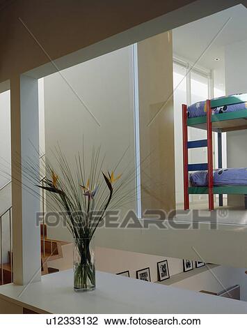 Modern openplan landing with view of bunkbeds in bedroom View Large Photo Image Stock Image - Modern openplan landing with view of bunkbeds in bedroom. Fotosearch