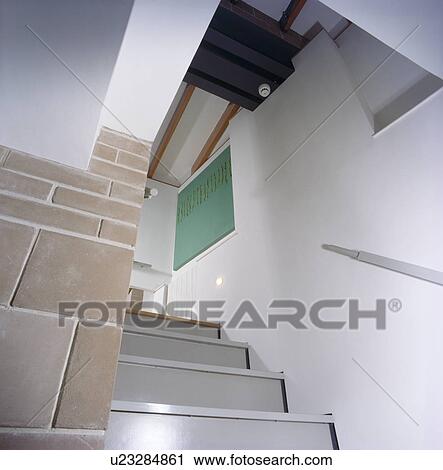 Modern staircase with stone wall View Large Photo Image Stock Image - Modern staircase with stone wall. Fotosearch