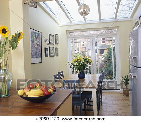 Modern townhouse dining room extension with glass roof View Large Photo Image Stock Photo - Modern townhouse dining room extension with glass roof. Fotosearch