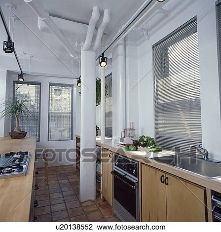 Modern white galley kitchen white white supporting pillar View Large Photo Image Stock Image - Modern white galley kitchen white white supporting pillar. Fotosearch