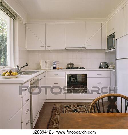 Stock Photography - Modern white kitchen. Fotosearch