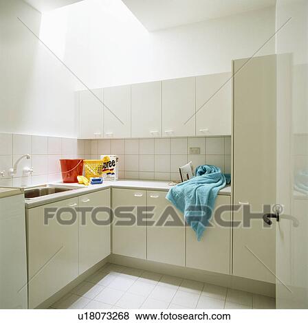 Modern white utility room View Large Photo Image Stock Photo - Modern white utility room. Fotosearch