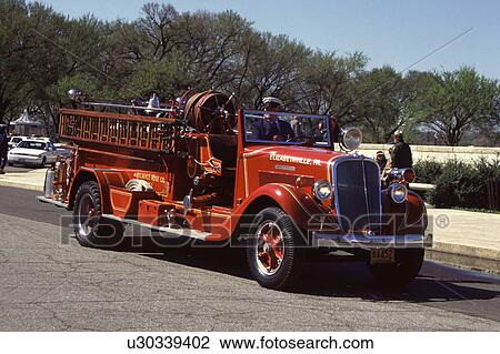 Old red American fire engine View Large Photo Image Stock Image - Old red American fire engine . Fotosearch