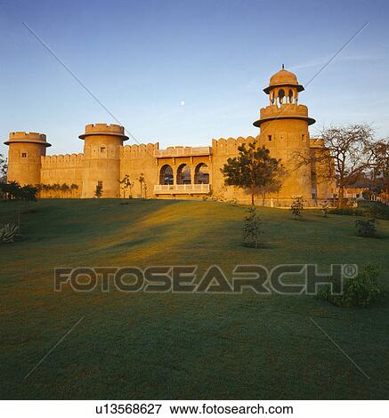 Stock Photo - Old sandstone fort now the Rajvilas Hotel near Jaipur in Rajastan. Fotosearch