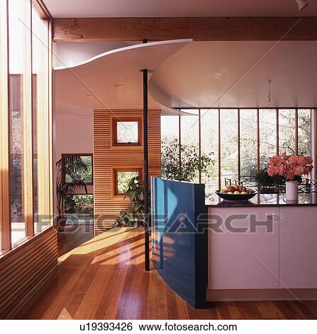 Openplan modern hall with integral kitchen and wooden flooring View Large Photo Image Stock Photograph - Openplan modern hall with integral kitchen and wooden flooring. Fotosearch