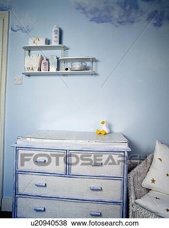 Painted blue+white chest of drawers in child's pastel blue bedroom View Large Photo Image Stock Photo - Painted blue+white chest of drawers in child's pastel blue bedroom. Fotosearch