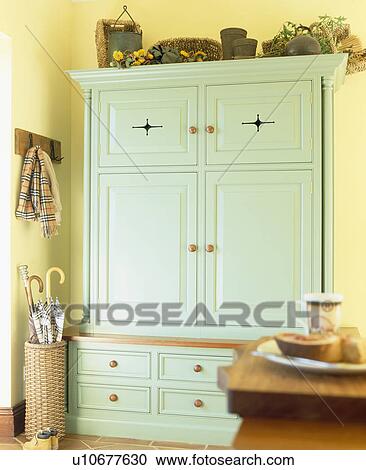 Pastel green dresser in yellow country kitchen View Large Photo Image Stock Image - Pastel green dresser in yellow country kitchen. Fotosearch
