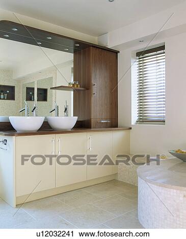 Philippe Starck Double Basins On Vanity Unit In Modern White Bathroom With Limestone Flooring Stock Image U12032241 Fotosearch