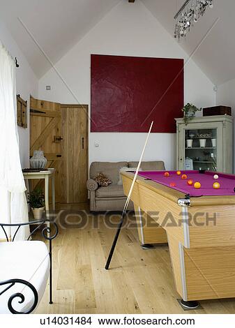Pool-table in small games-room with wooden flooring View Large Photo Image Picture - Pool-table in small games-room with wooden flooring. Fotosearch