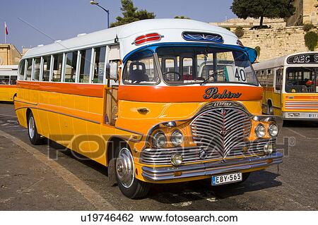 Stock Image - Public transport bus, parked at the bus terminus in Valletta on the island of Malta. Fotosearch