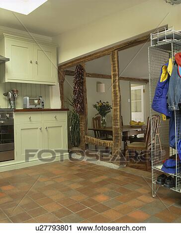Quarry-tiled floor in country kitchen extension View Large Photo Image Stock Image - Quarry-tiled floor in country kitchen extension. Fotosearch