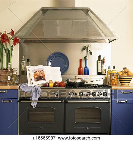 Stock Photo - Range oven in modern kitchen with majuve units. Fotosearch