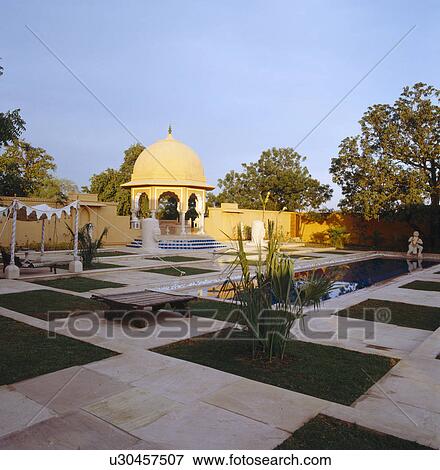 Sandstone walls and pavilion in marble courtyard with tranquil pool at the Rajvilas Hotel near Jaipur in Rajastan View Large Photo Image Stock Photo - Sandstone walls and pavilion in marble courtyard with tranquil pool at the Rajvilas Hotel near Jaipur in Rajastan. Fotosearch