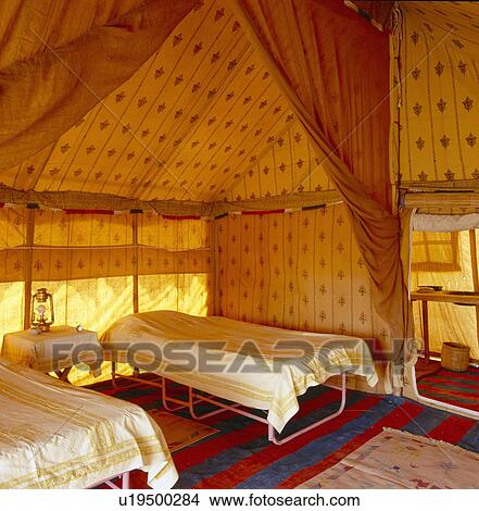Simple beds in traditional Rajastani tent at Nagaur Fort in Rajastan View Large Photo Image Picture - Simple beds in traditional Rajastani tent at Nagaur Fort in Rajastan. Fotosearch