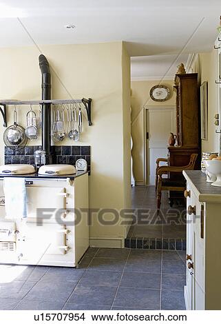 Slate flooring in country kitchen with cream Aga View Large Photo Image Picture - Slate flooring in country kitchen with cream Aga. Fotosearch
