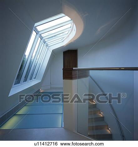 Sloping windows above modern landing View Large Photo Image Stock Photograph - Sloping windows above modern landing. Fotosearch