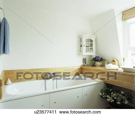 Stock Image - Small modern white bathroom. Fotosearch