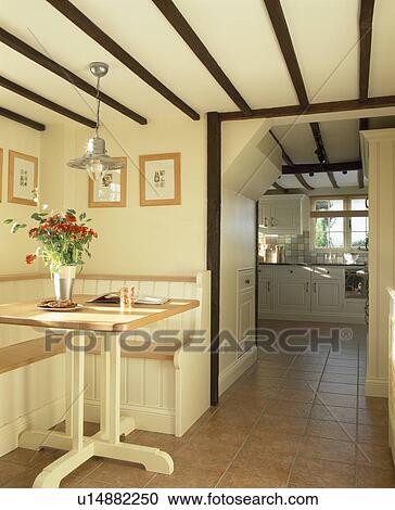 Small Table And Bench Seating In Dining Area Off Cream Cottage