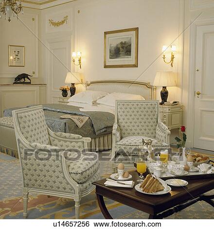 Small table with breakfast on tray in hotel bedroom View Large Photo Image Stock Photograph - Small table with breakfast on tray in hotel bedroom. Fotosearch