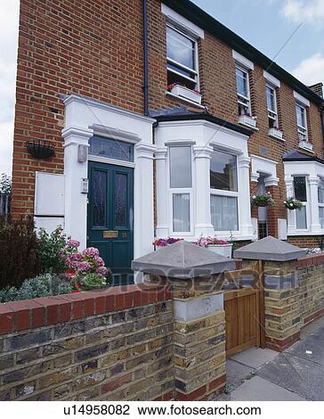 Small terraced Edwardian house with white paintwork View Large Photo Image Stock Image - Small terraced Edwardian house with white paintwork. Fotosearch