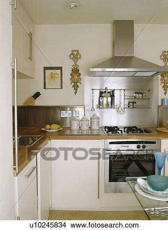 Small traditional cream kitchen View Large Photo Image Picture - Small traditional cream kitchen. Fotosearch