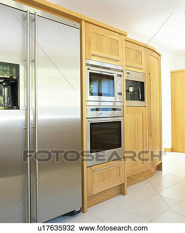 Stock Photo Of Stainless Steel American Style Fridge Freezer And Stainless Steel American Style Fridge Freezer And Double Oven In Modern Kitchen