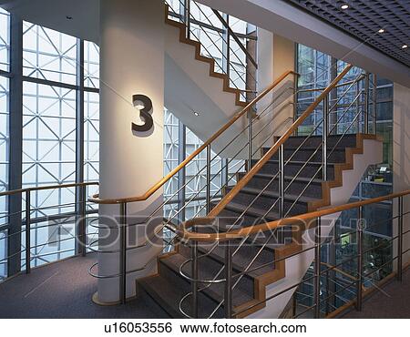 Staircase in modern steel and glass office block View Large Photo Image Stock Photograph - Staircase in modern steel and glass office block. Fotosearch