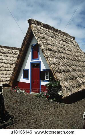 Typical triangular A-framed house in Santana on the island of Madeira View Large Photo Image Stock Photograph - Typical triangular A-framed house in Santana on the island of Madeira. Fotosearch
