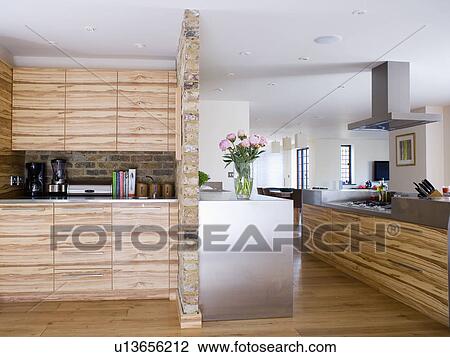 Veneered fitted units in large modern kitchen extension View Large Photo Image Stock Image - Veneered fitted units in large modern kitchen extension. Fotosearch