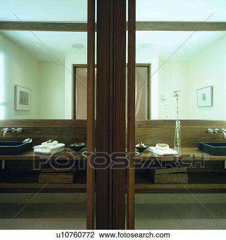 Veneered vanity unit in modern bathroom View Large Photo Image Stock Image - Veneered vanity unit in modern bathroom. Fotosearch