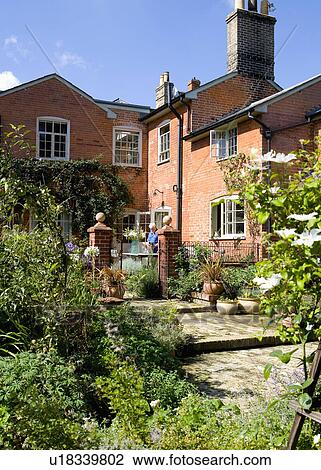 Wall courtyard and red brick 19th century country house View Large Photo Image Stock Image - Wall courtyard and red brick 19th century country house. Fotosearch