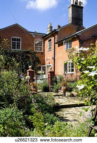 Wall courtyard and red brick 19th century country house View Large Photo Image Stock Image - Wall courtyard and red brick 19th century country house. Fotosearch