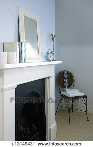 White fireplace in pastel blue bedroom View Large Photo Image Stock Image - White fireplace in pastel blue bedroom. Fotosearch