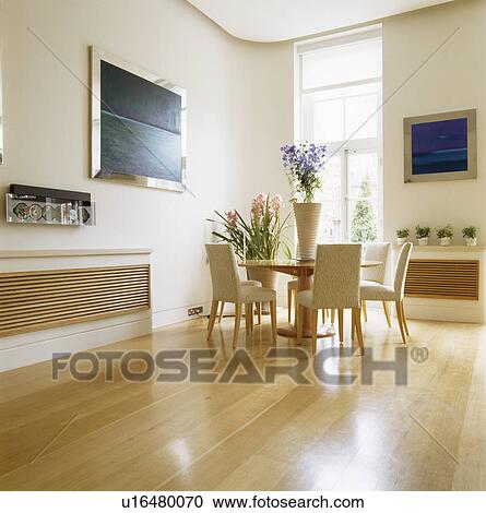 Wooden flooring in modern white dining room View Large Photo Image Stock Image - Wooden flooring in modern white dining room. Fotosearch