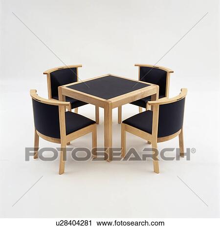 Wooden framed black chairs with matching table View Large Photo Image Stock Image - Wooden framed black chairs with matching table. Fotosearch