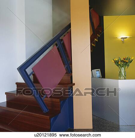 Stock Photography - Wooden staircase with pink and blue square bannisters. Fotosearch