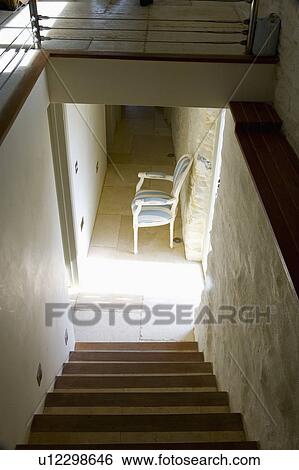 Aerial view of wooden staircase and small narrow hall in converted coastal boathouse View Large Photo Image Stock Photograph - Aerial view of wooden staircase and small narrow hall in converted coastal boathouse. Fotosearch