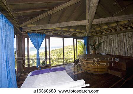 Stock Photo - Bedroom with jacuzzi in hotel in Brazil.. Fotosearch