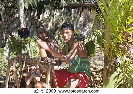 Brazil Craftesman working on products for sale to tourists. View Large Photo Image Stock Photo - Brazil Craftesman working on products for sale to tourists.. Fotosearch